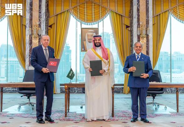 https://cdn.shortpixel.ai/client/to_auto,q_lossless,ret_img,w_1024,h_709/https:/uames.org.ua/wp-content/uploads/2026/08/a_scene_from_the_signing_of_the_makkah_joint_defense_agreement-1024x709.jpg
